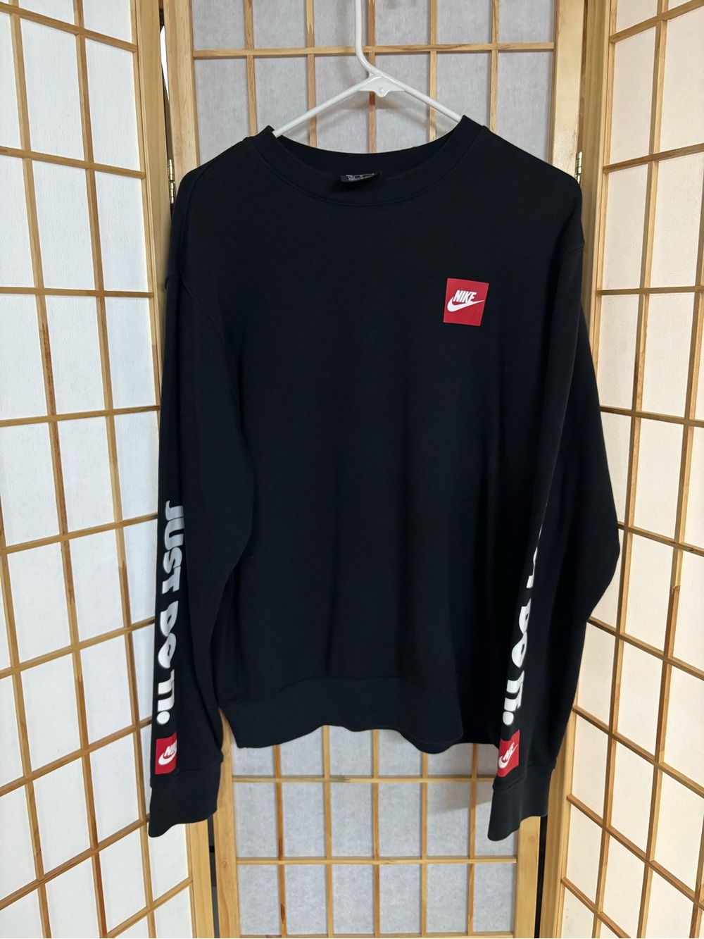 Nike Men’s Black Crewneck Sweatshirt with Red Logo Accents - Picture 2 of 4